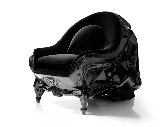 Skull armchair by Harold Sangouard with a geometric, multifaceted skull design in black resin and velvet