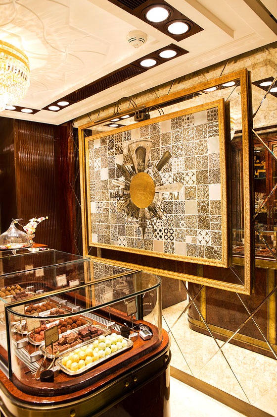 Four Seasons Chocolate Shop Istanbul with luxury glass counter, artistic wall mosaic, and premium chocolate selection