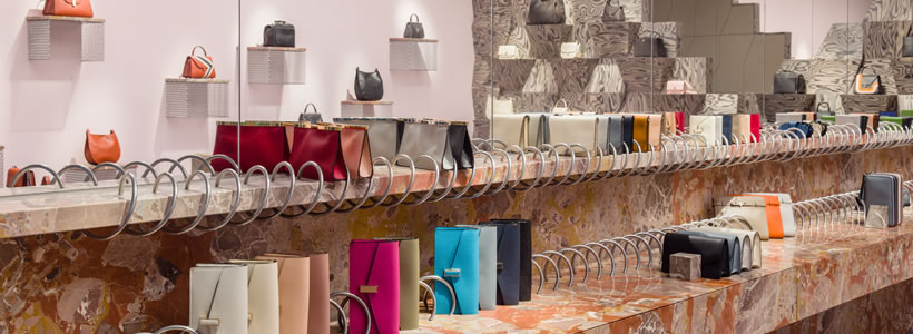 Valextra Miami store with marble and metal display for leather goods
