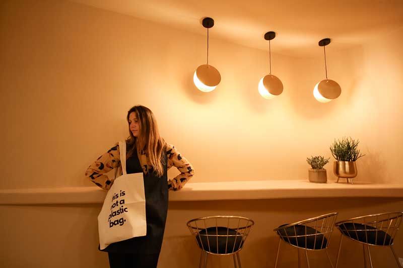 Curved interiors and beige surfaces inside Cannoncino pastry shop