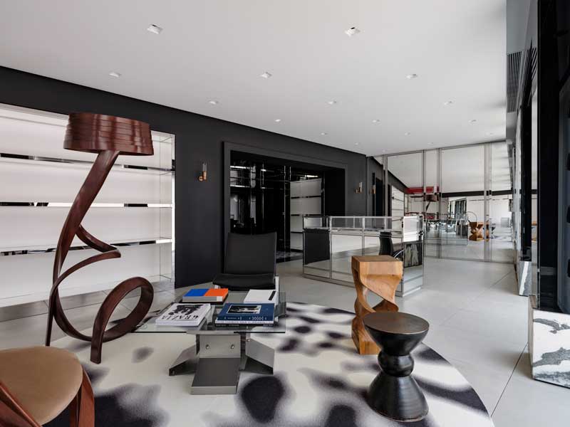 Casa Calvinluo Shanghai art lounge with sculptural furniture and black red palette