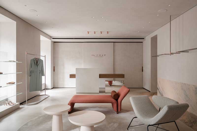 Interior view of The COAT by Katya Silchenko showroom in Kyiv designed by Rina Lovko, with bright, minimalist and elegant interiors