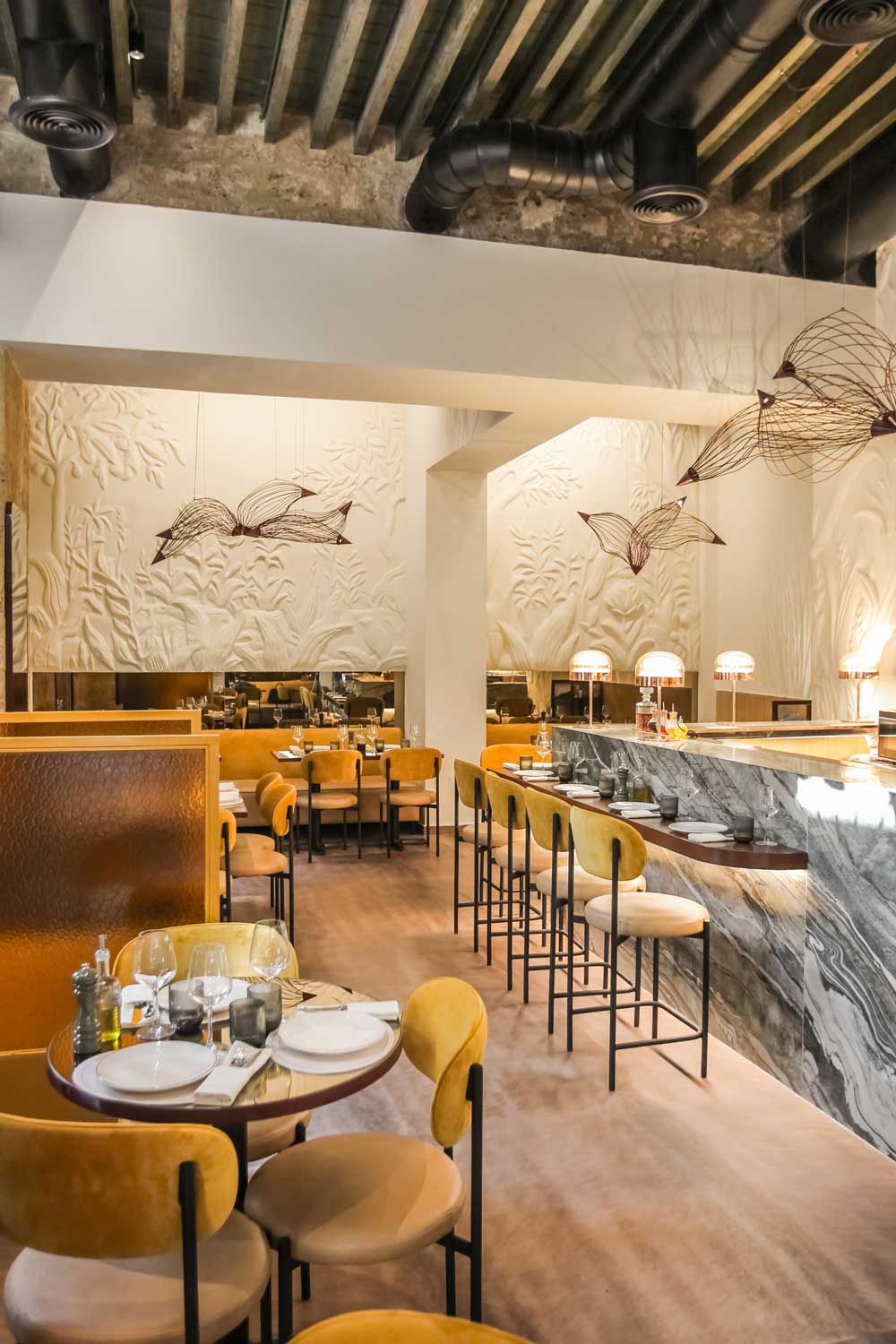 Detail of handcrafted elements and decorative surfaces in Bobo bistrot
