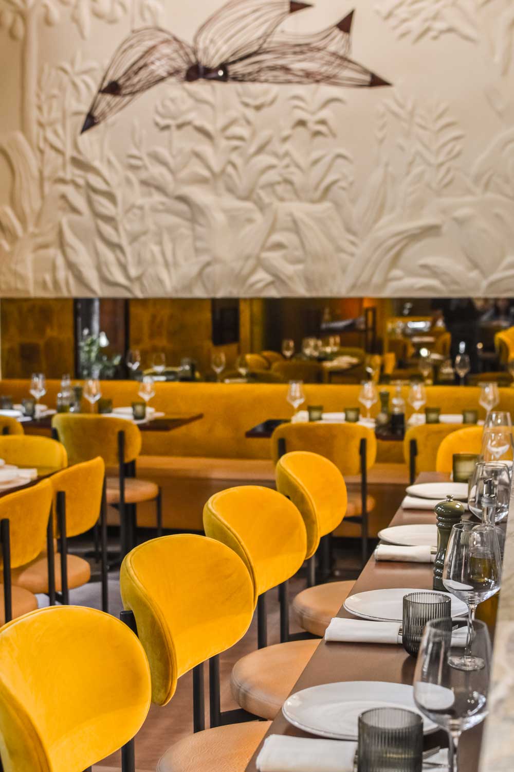 Interior layout of Bobo with custom furniture and soft lighting atmosphere