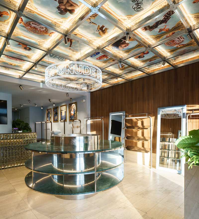 Nude Project flagship store in Milan inspired by traditional Italian architecture, designed by El Departamento