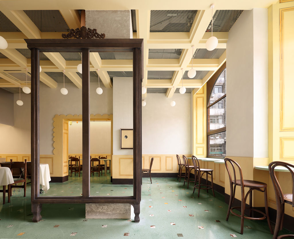 Interior of Bitter Sweetie dessert shop in Tianjin with Italian-style arches and historical red brick architecture