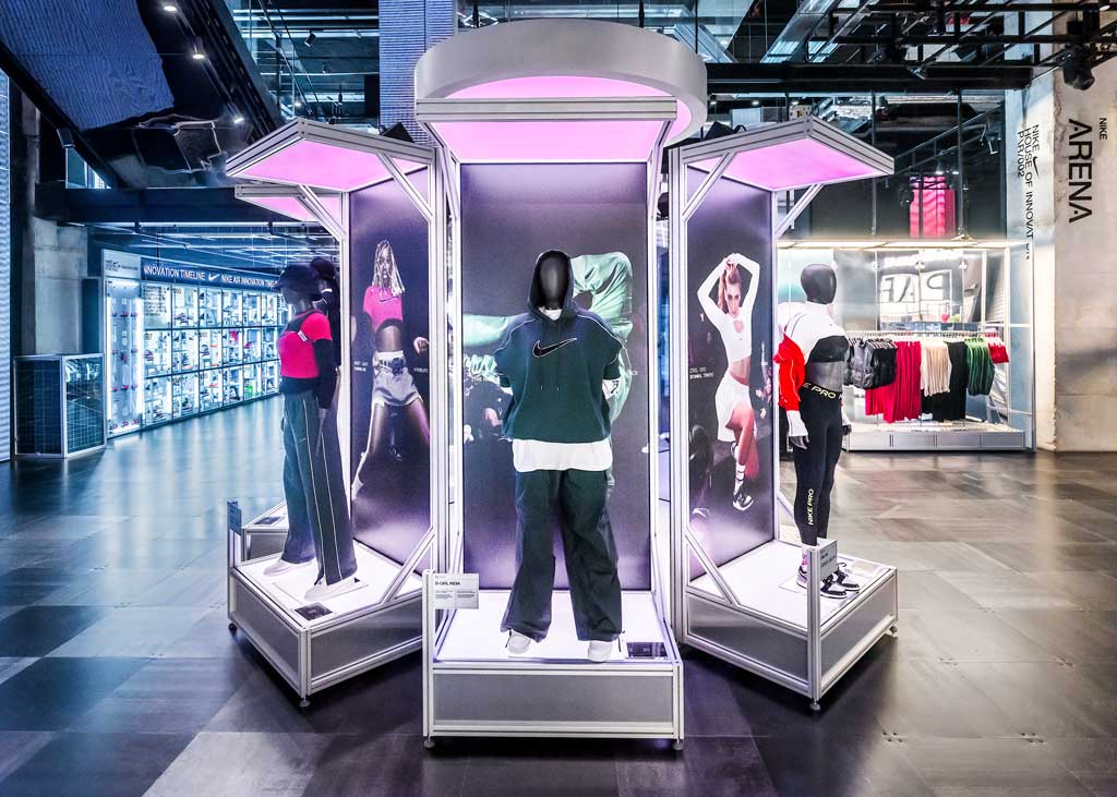 Interactive installation inside Nike House of Innovation with theatrical lighting and central stage