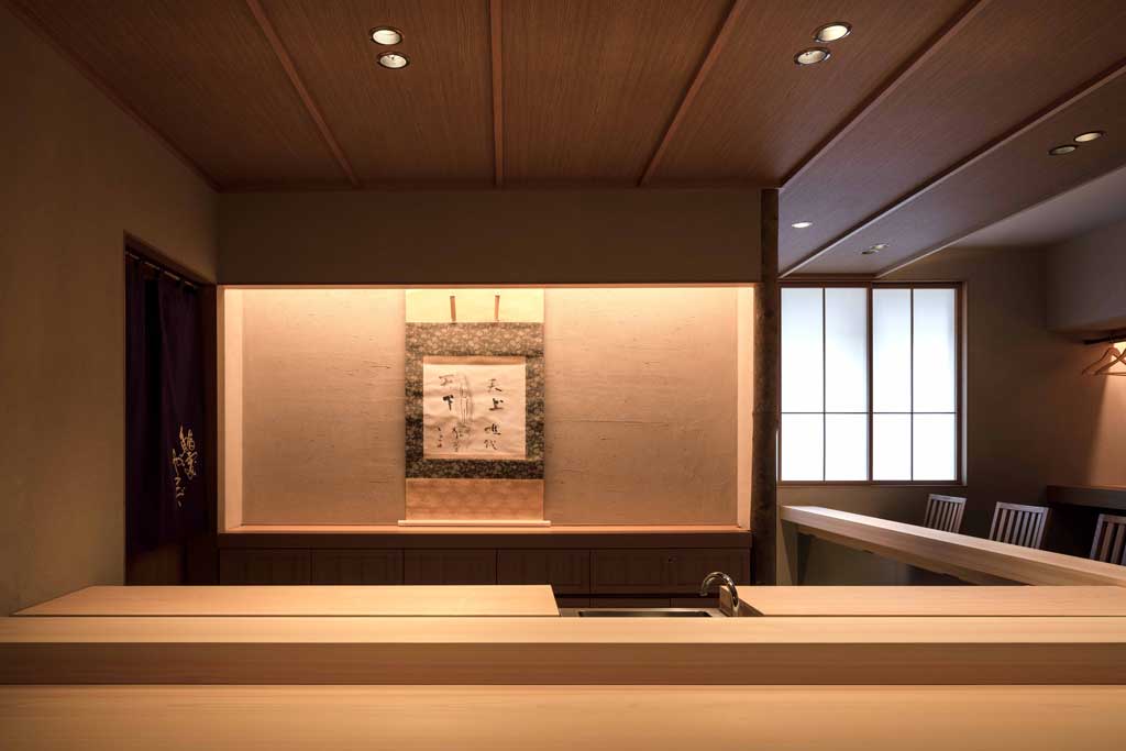 Sushidokoro Yamada restaurant interior with natural wood sushi counter in Ginza