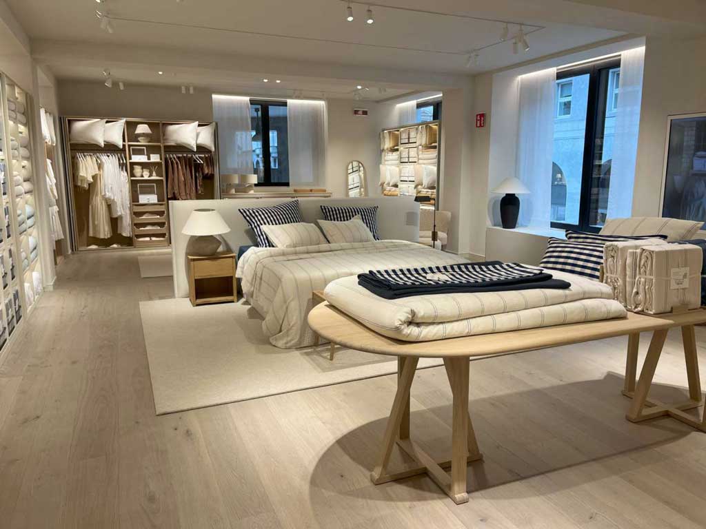 Area vendita Zara Home a Milano con layout aperto, arredi su misura e finiture naturali