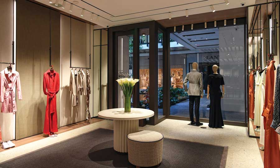 Retail space with lighting design and circulation paths in Kiton store