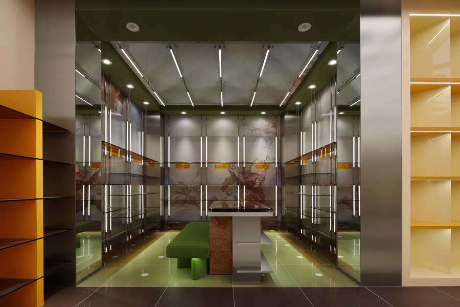 Layout retail aperto con aree dedicate a scarpe e borse nel negozio Coscia