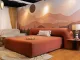 Camera d’hotel dal design fluido ispirato al deserto