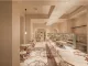 Bancone pasticceria con finiture in marmo e dettagli in ottone