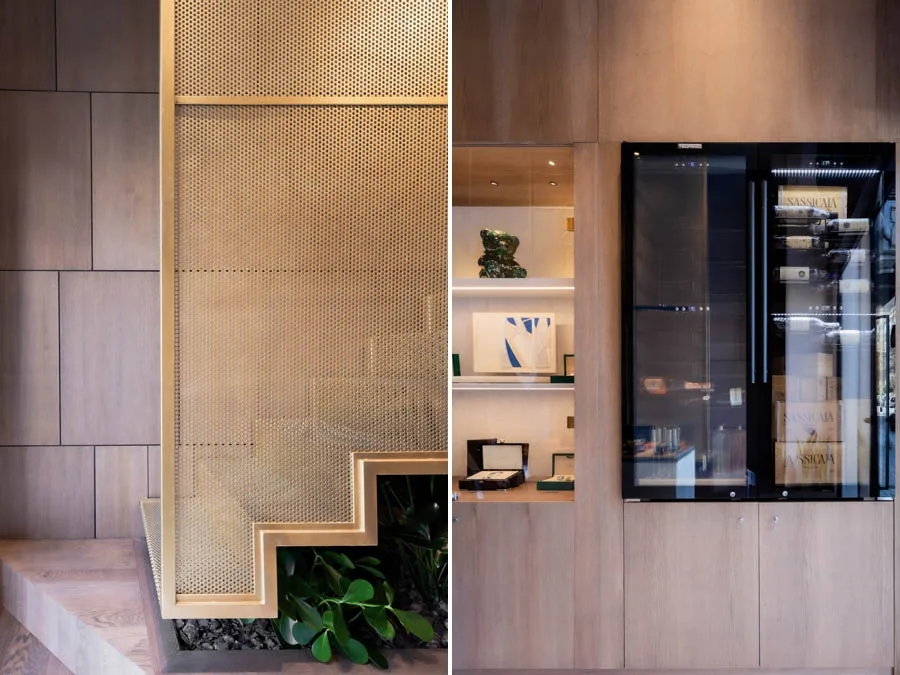 Details of Boutique M5 Original Luxury in Palermo: golden metal staircase and custom built-in wine cabinet