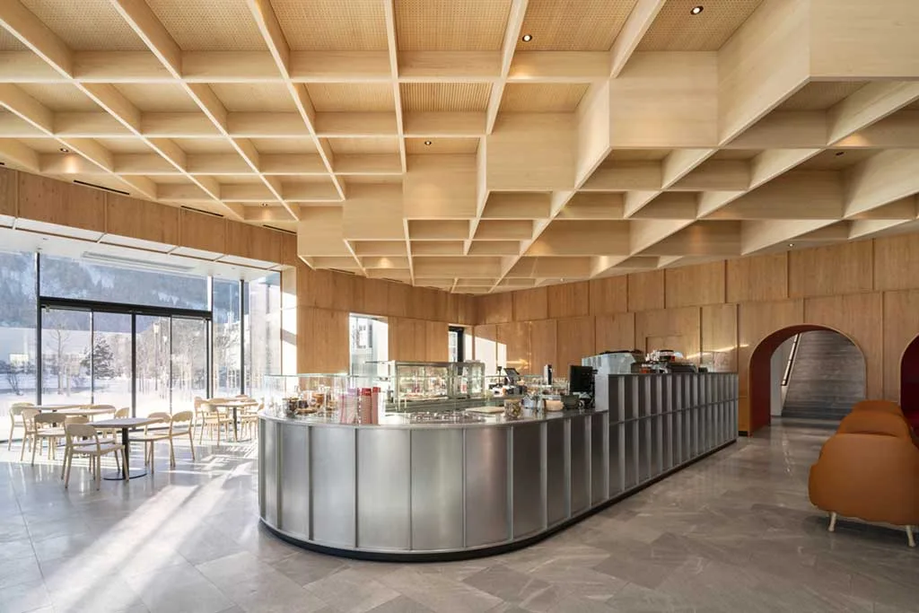 The imposing wood and stainless steel counter of the Loacker Galaxy flagship store