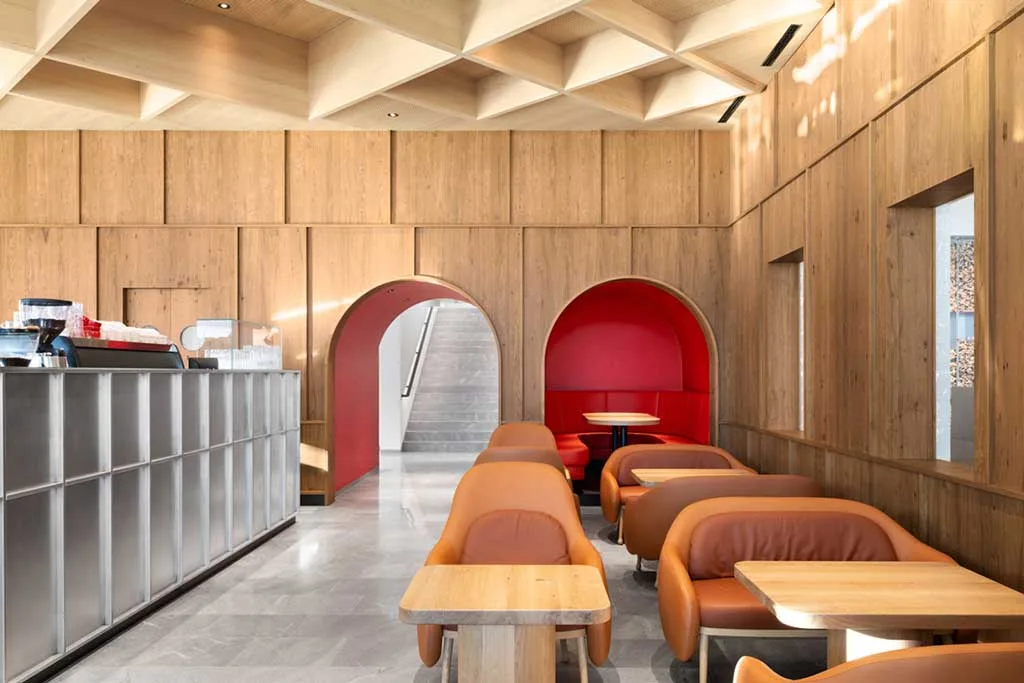 Wood and stainless steel interiors of the Loacker Galaxy flagship store