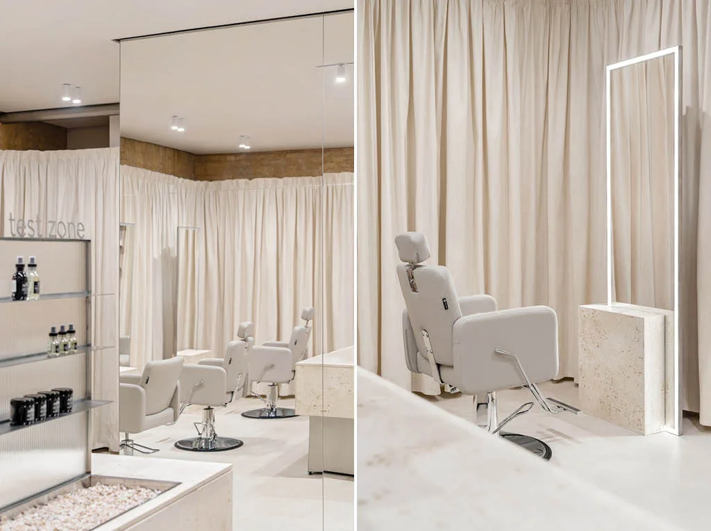 Zona test e trattamento del PLEKA Showroom a Kyiv con poltrone professionali e tenda avvolgente