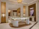 Interni Boutique Damiani a Riad con arredi arrotondati e design italiano