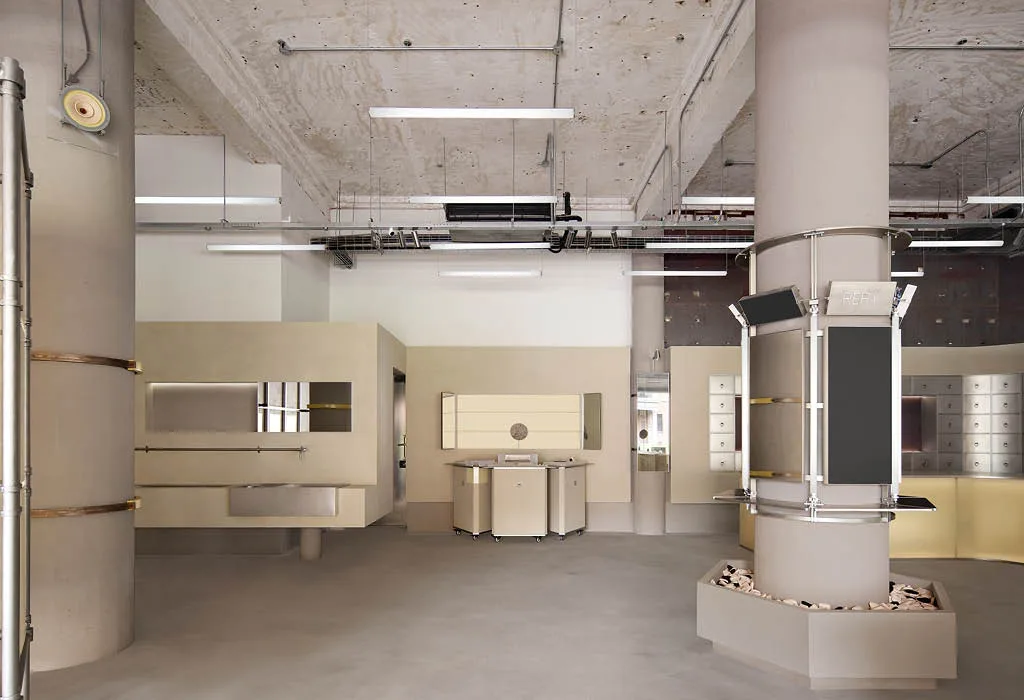 Vista degli elementi espositivi modulari e delle colonne centrali nella RERY Fashion Lifestyle Gallery a Shanghai, con arredi mobili e pareti multifunzione