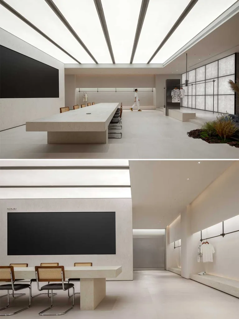 Ingresso dello showroom moda a Foshan progettato da LubanEra Design – luce zenitale, paesaggio vegetale e reception in pietra.
