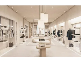 Interni flagship store Eleventy a Toronto con arredi in rovere e design minimal