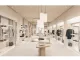 Interni flagship store Eleventy a Toronto con arredi in rovere e design minimal