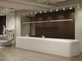 Bancone in Corian termoformato e interni minimalisti della Boutique Klozet a Moncton firmata Entre Quatre Murs