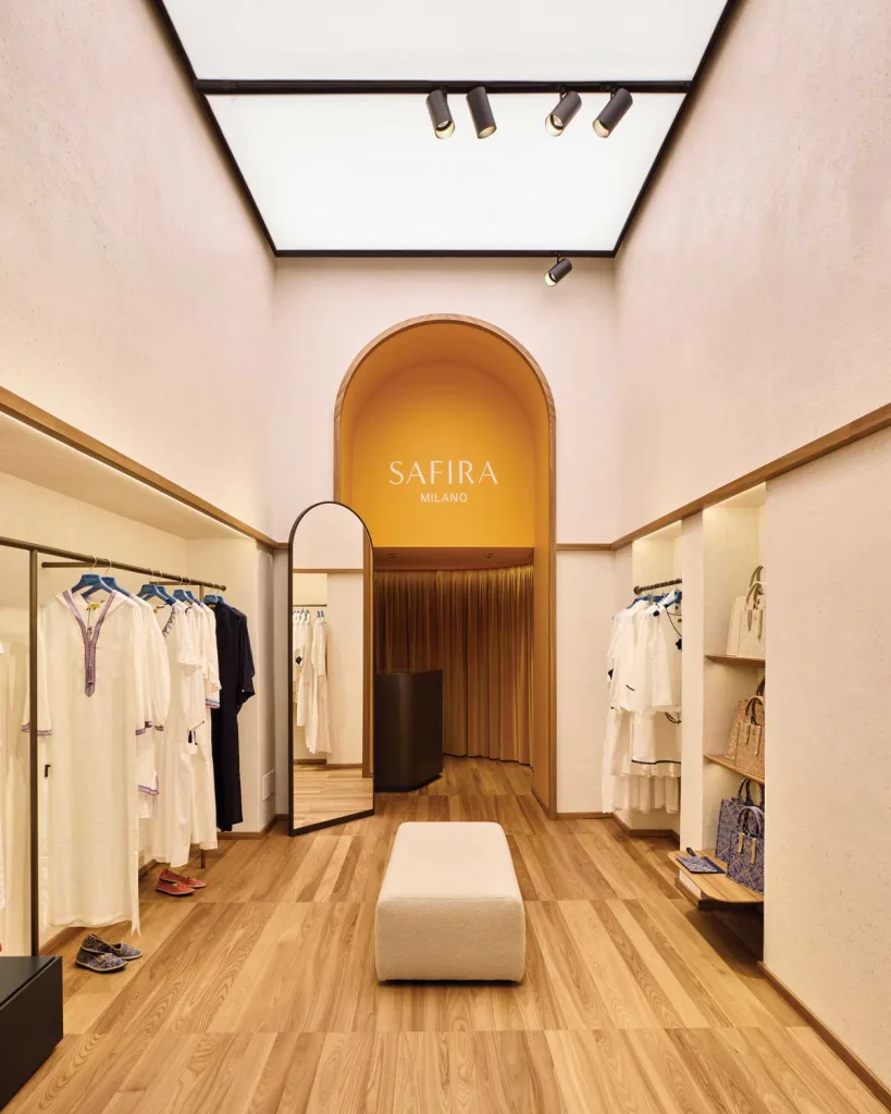 Detail of the restored 19th-century arch inside the Safira Milano boutique