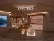 Interno del flagship store KSISTERS a Singapore progettato da Open Studio, con elementi in legno e volumi retroilluminati ispirati all’architettura Hanok