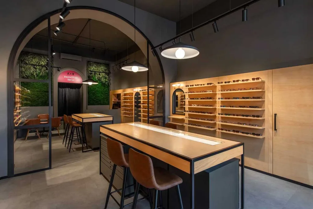 Detail of eyewear display and industrial finishes in Ottica Horus