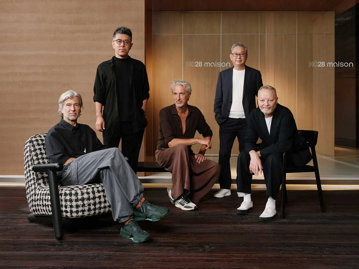 Portrait of the designers featured in the HC28 maison exhibition, photographed inside the gallery space