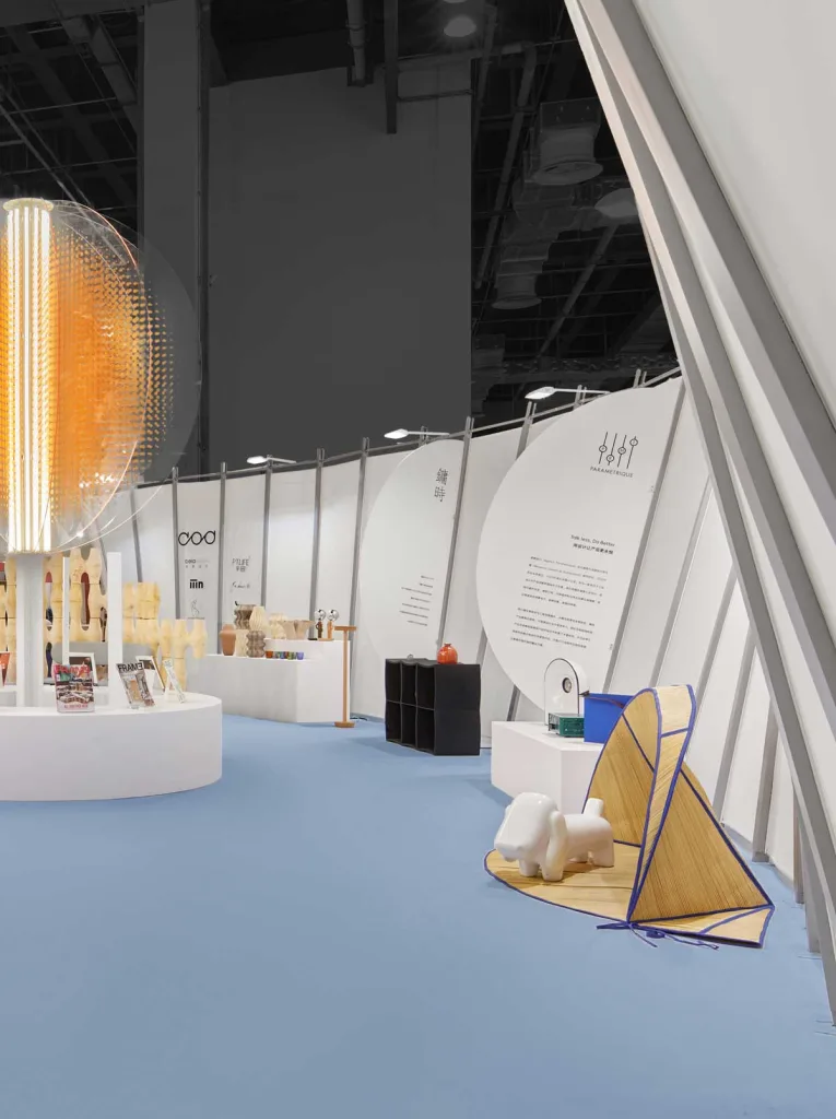 Eye-Opener exhibition by Dayuan Design showcasing circular layout, sustainable materials and design pieces from various brands.