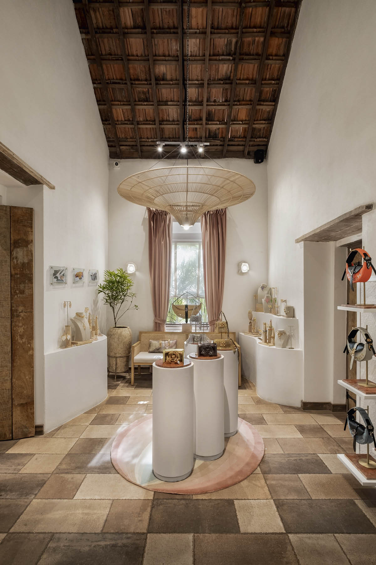 Outhouse Jewellery Goa boutique designed by Studio Hasta, interior with white limewashed walls and fluid carved surfaces