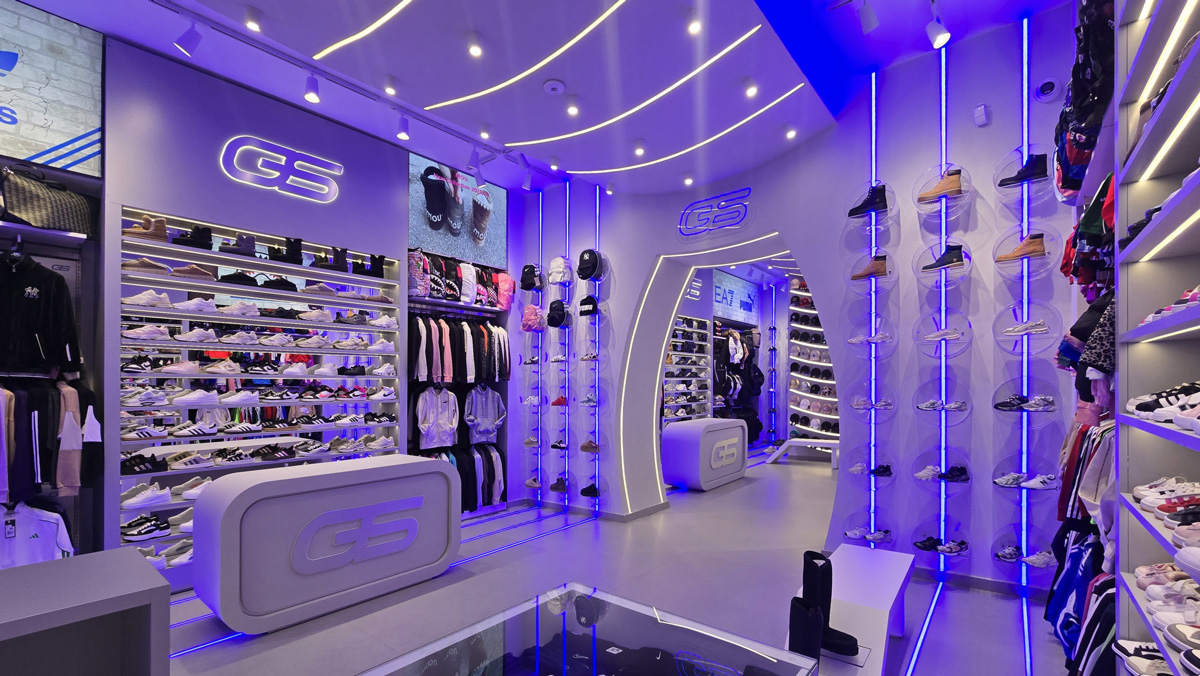Galaxy Store Naples sneaker display and checkout counter in a contemporary sneaker store retail design