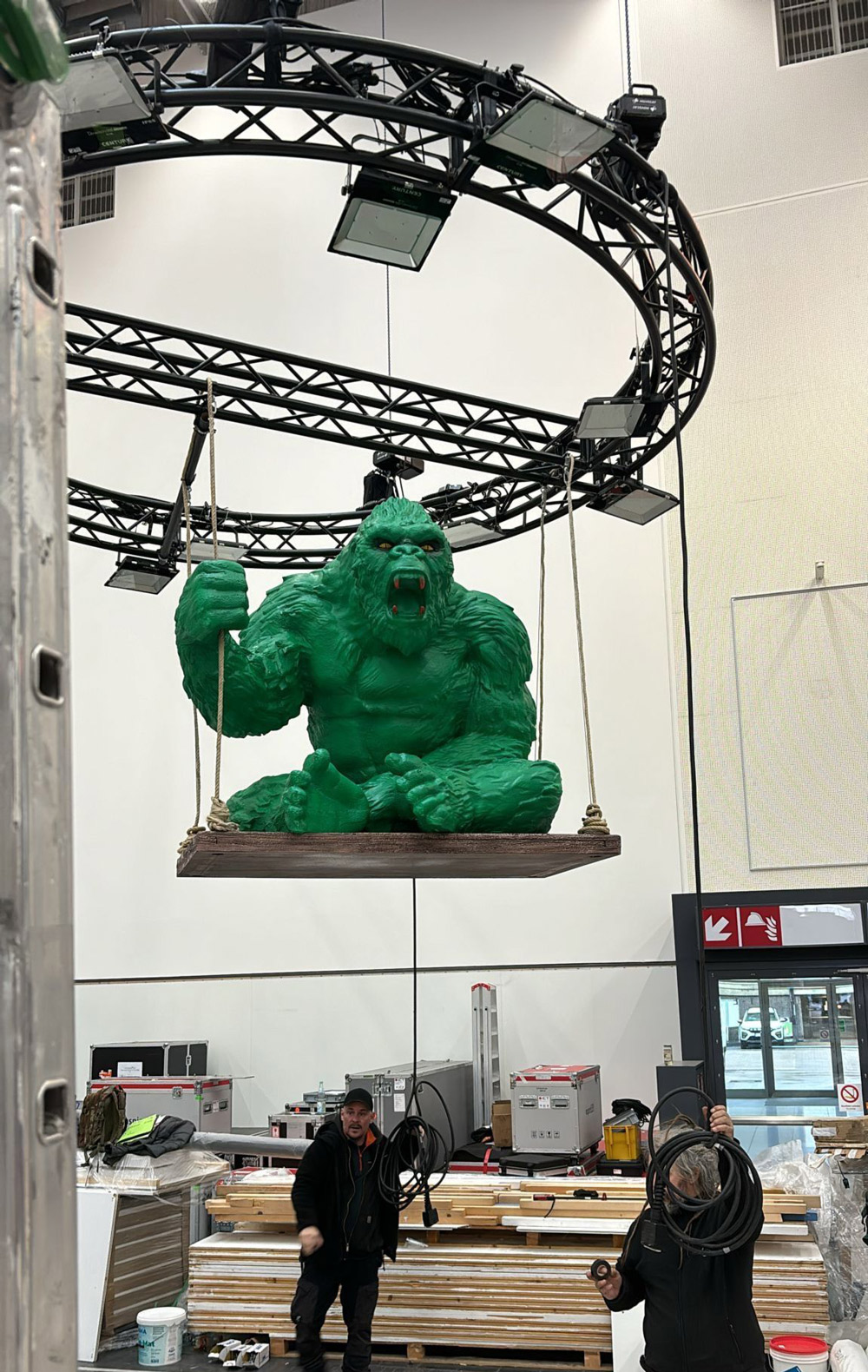 green kong installation montecolino euroshop suspended scenic element stand design