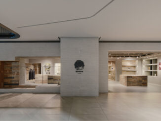 Facciata dello store Hirono a Shanghai con aperture incassate, vetrine narrative e volume esterno compatto