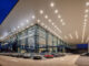 Progetto di illuminazione retail LED per showroom Mercedes-Benz AGAM con sistema DALI e controllo avanzato della luce.