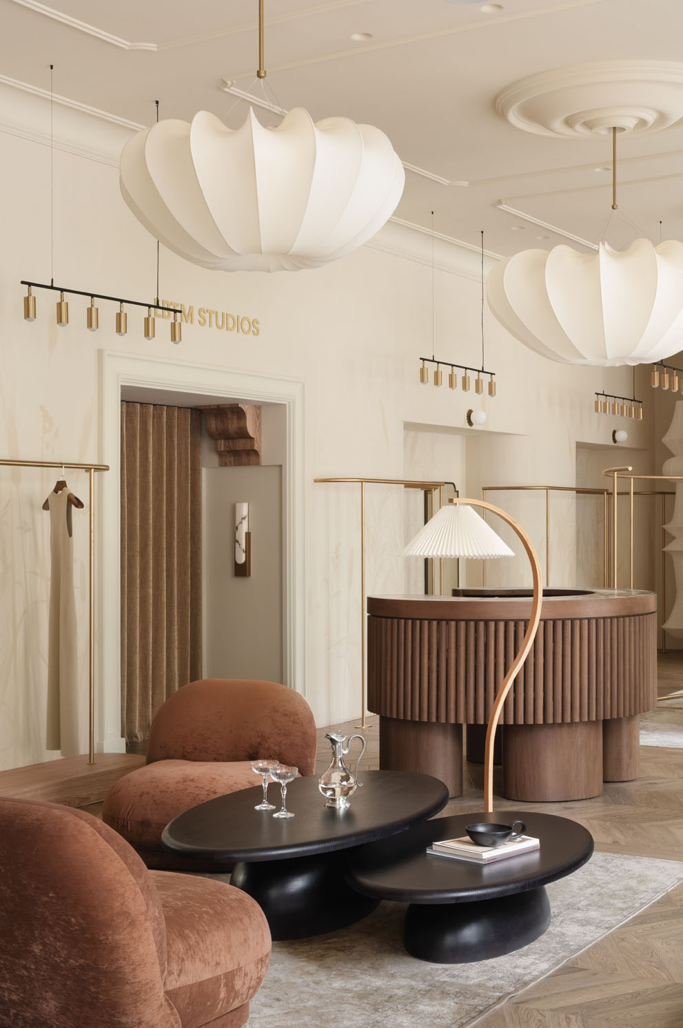 sculptural chandeliers inside Love by the Moon boutique designed by HE.D group in Kyiv