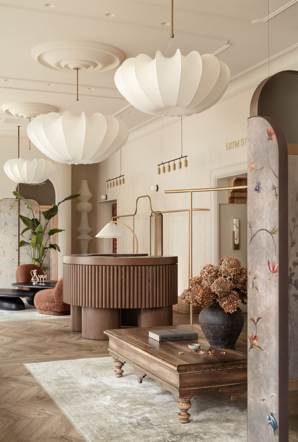 wood counter and retail area inside Love by the Moon boutique designed by HE.D group in Kyiv