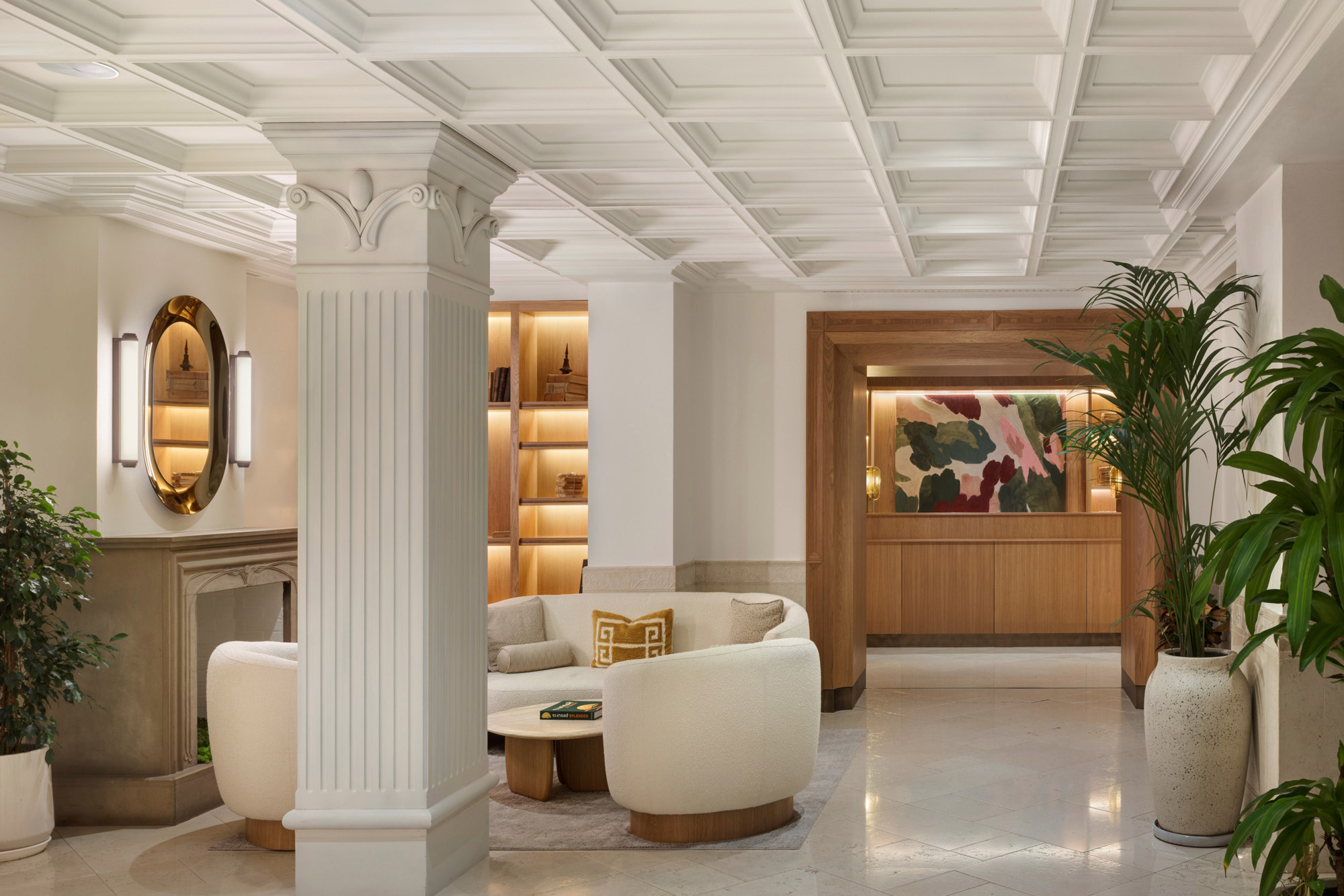 Lounge area with historic fireplace and contemporary seating at METT Barcelona