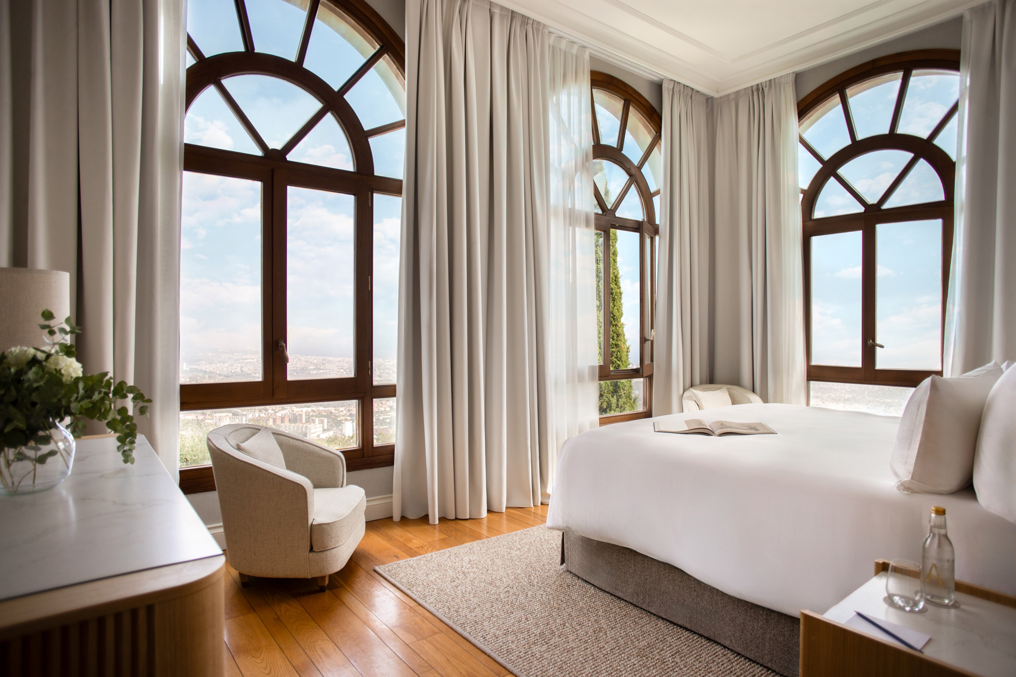 Suite at METT Barcelona with arched windows and panoramic view