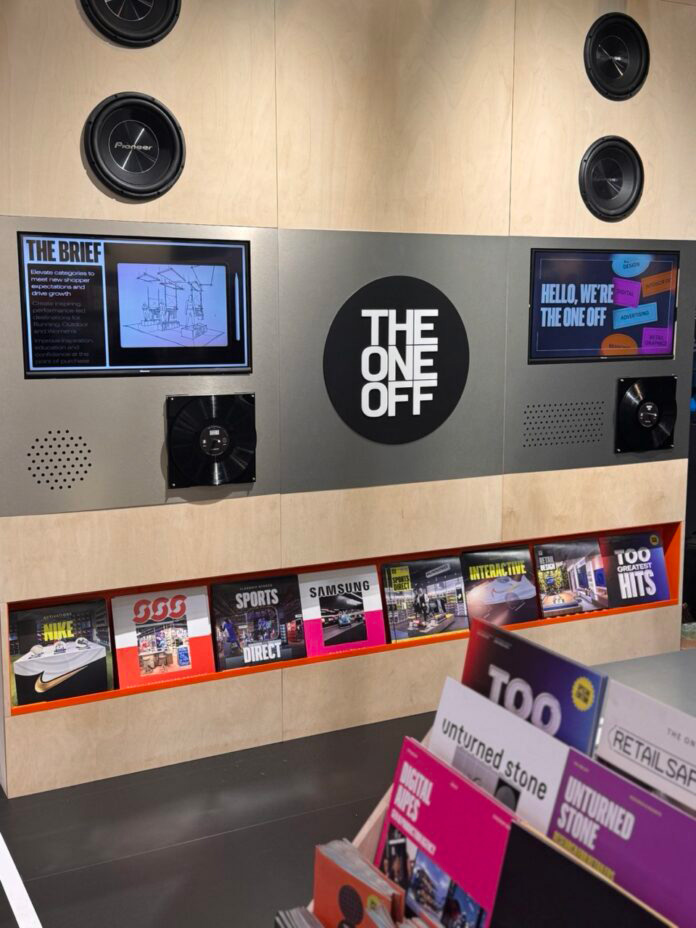 The One Off stand at EuroShop featuring interactive record store concept with vinyl sleeve displays