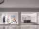Facciata dello store A SURNAME a Shenzhen con vetrina minimale e ingresso illuminato