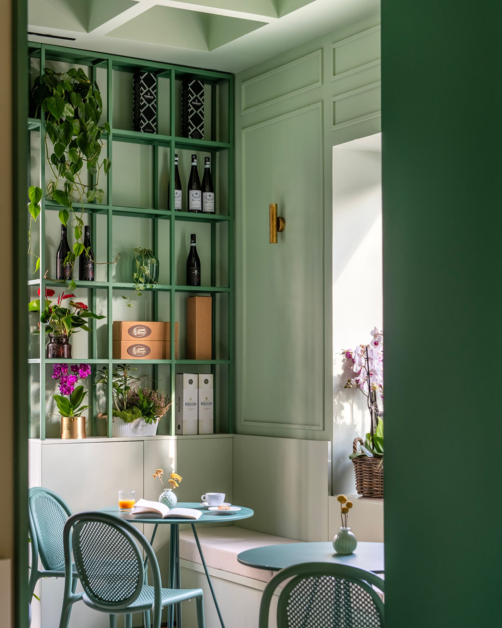 Custom shelving and lounge seating inside Bar Galatea hospitality project in Palermo