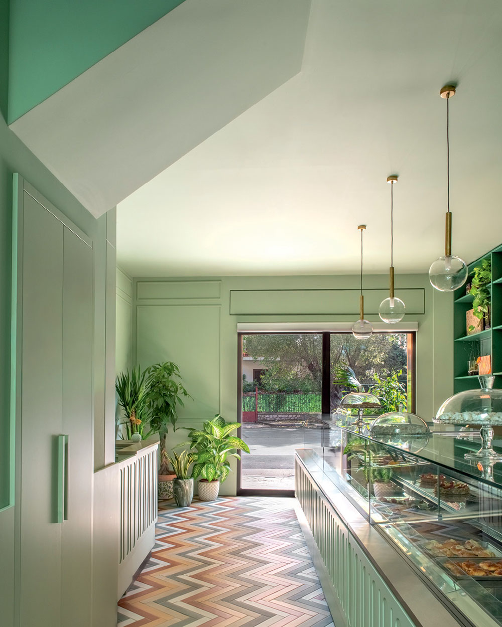 Bar Galatea counter area with suspended lighting and contemporary Mediterranean hospitality design