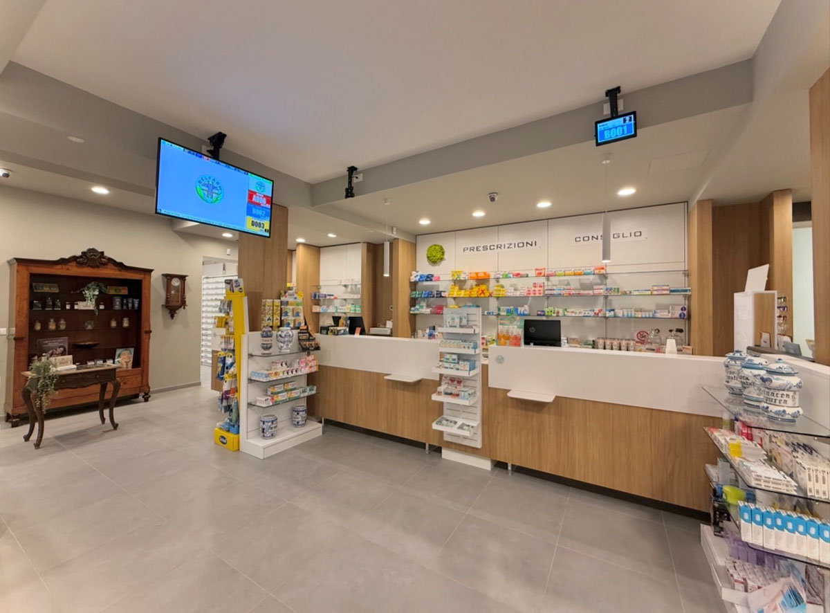 Illuminated pharmacy shelving with integrated product organization