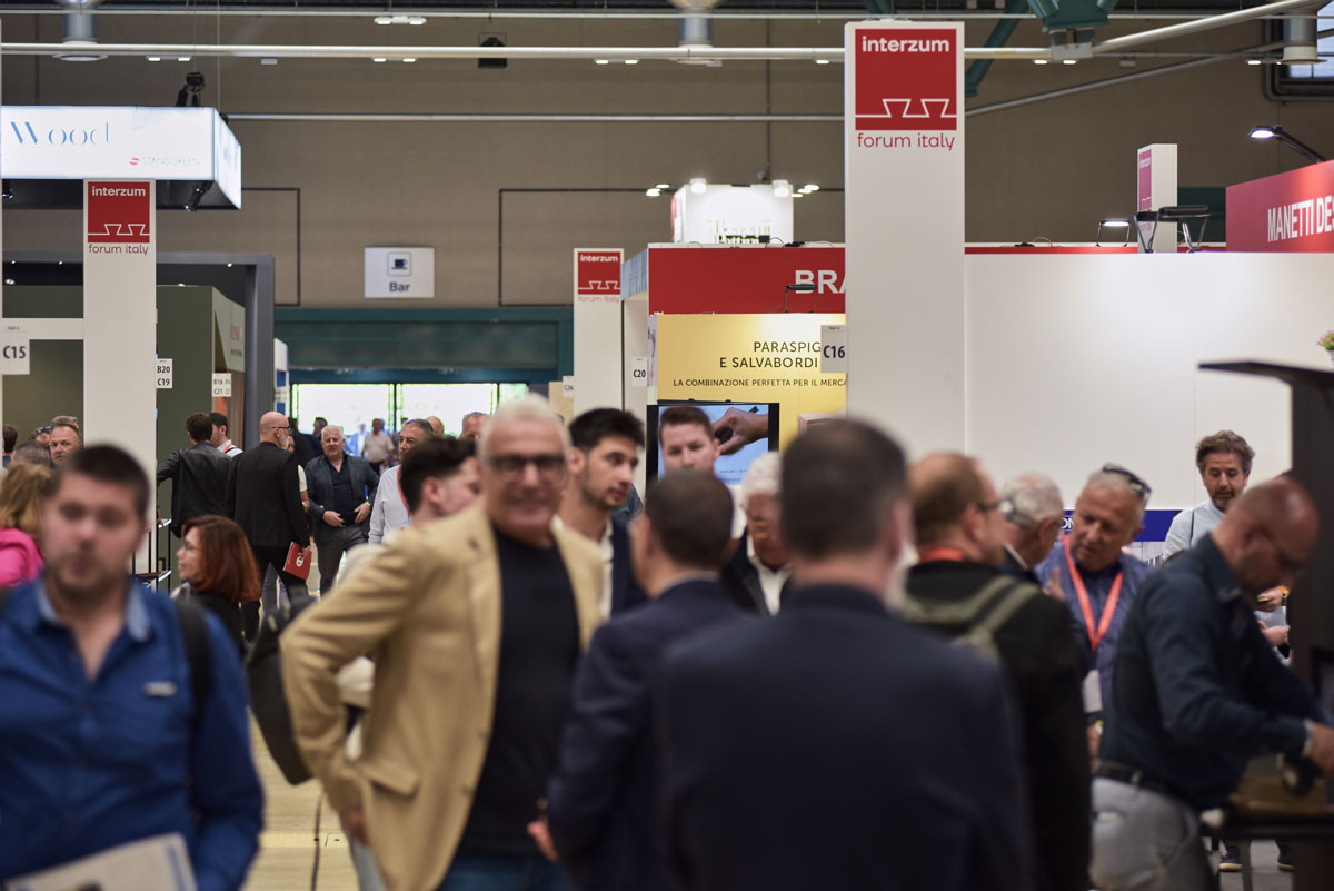 visitors and companies in the interzum forum italy exhibition spaces dedicated to the furniture and contemporary design supply chain