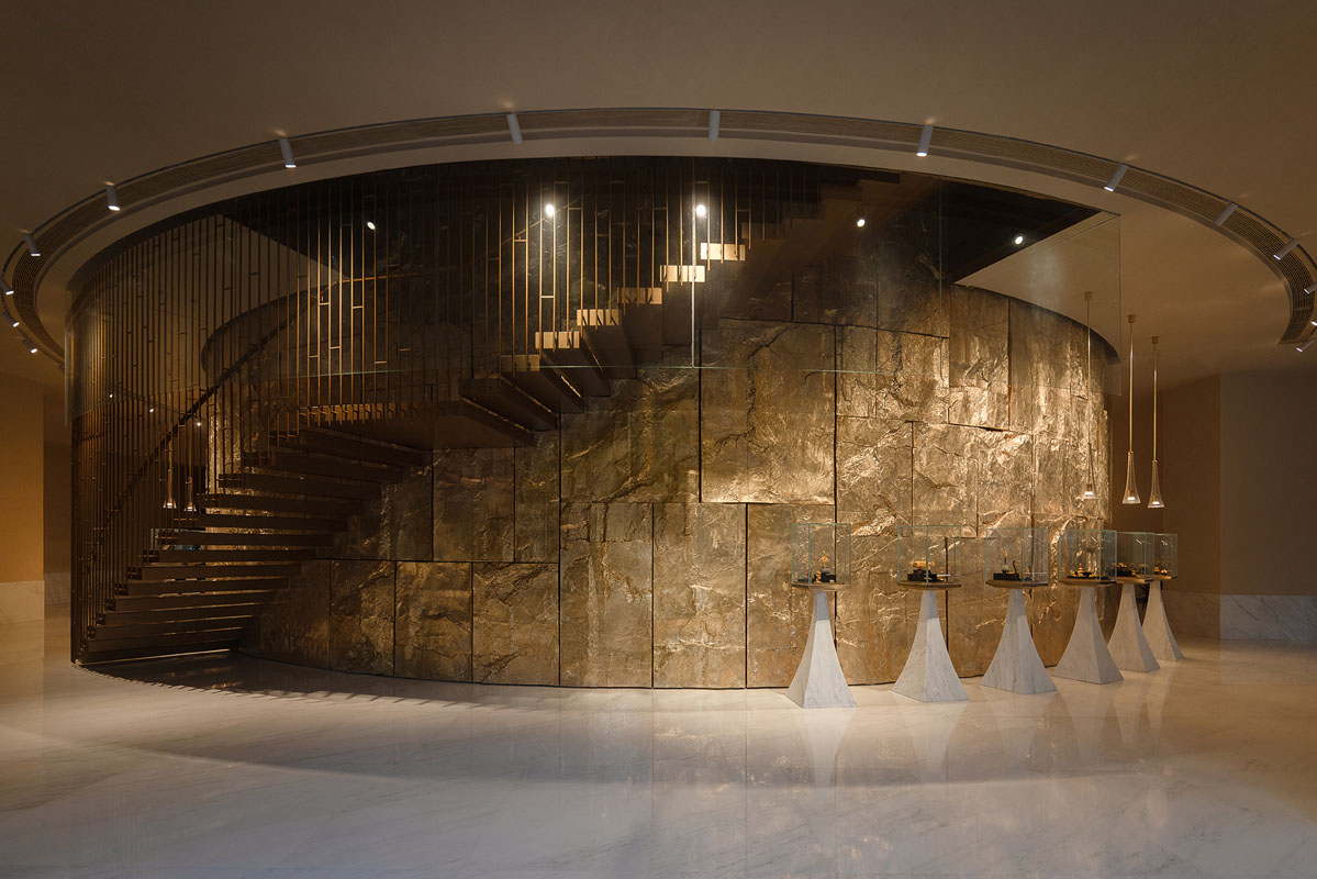Retail display area with marble podiums inside the Lao Feng Xiang jewelry flagship
