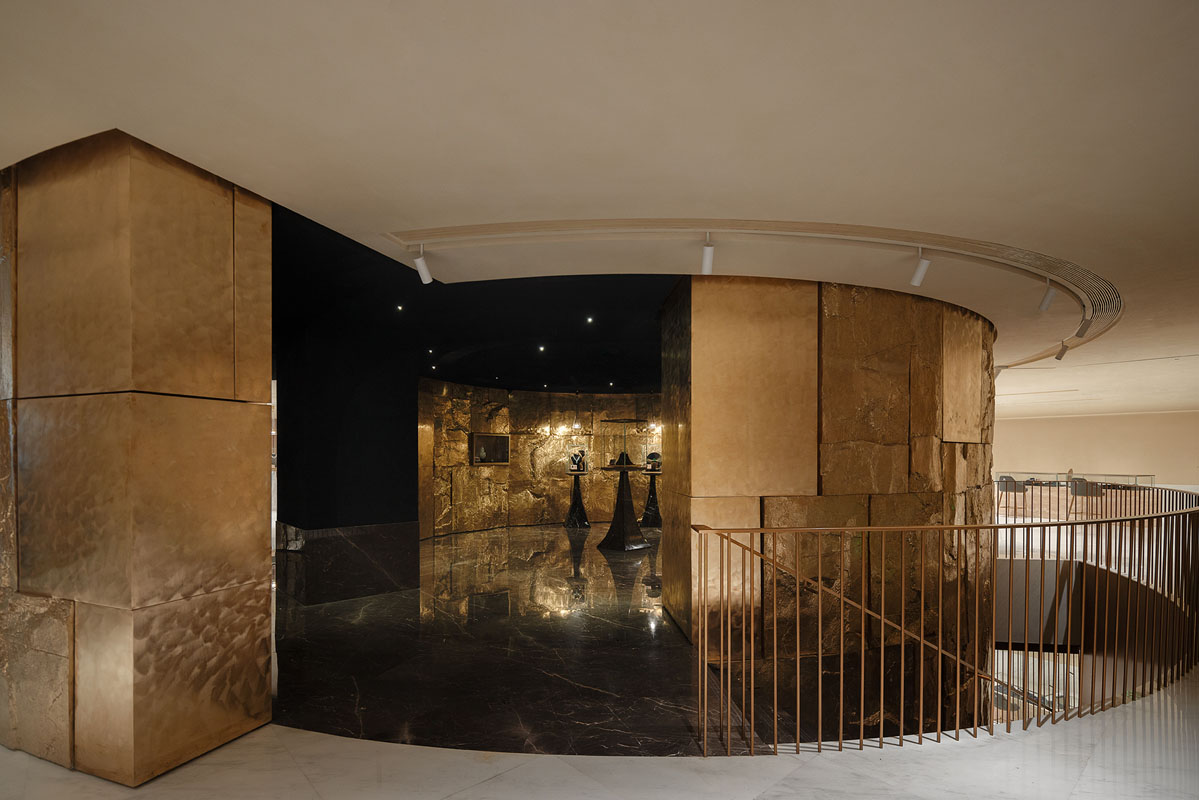 Jewelry displays illuminated by dramatic lighting inside the Lao Feng Xiang flagship in Shanghai