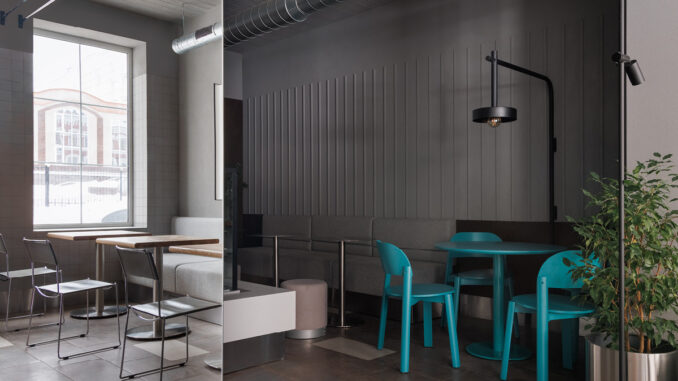 Area seating del Portland Coffee a Saratov con sedute turchesi, pannelli verticali scanalati e illuminazione industriale minimale